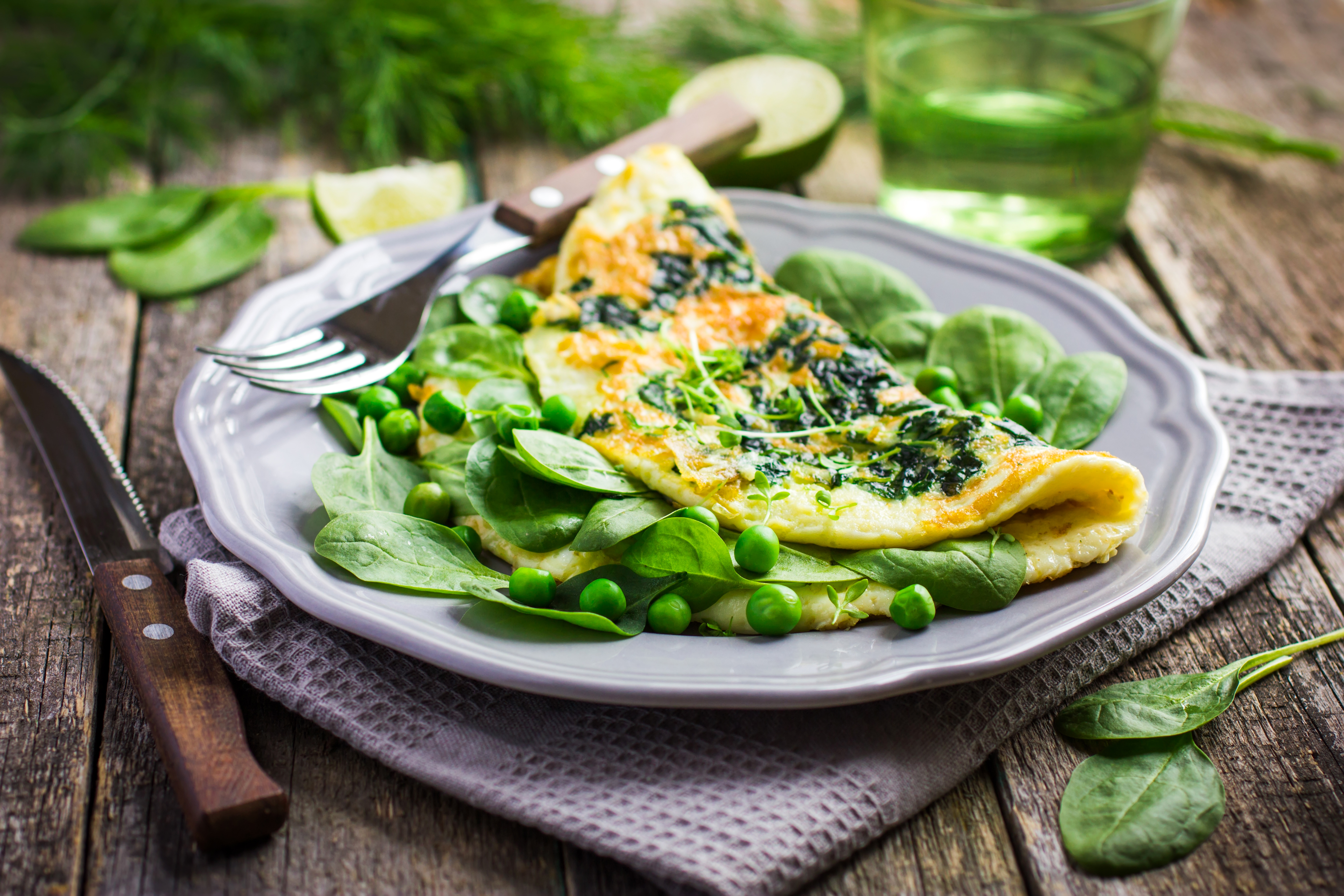 Image of Egg Omelette With Coriander Leaves And Red Chillies In A Banana  Leaf.-BD580498-Picxy