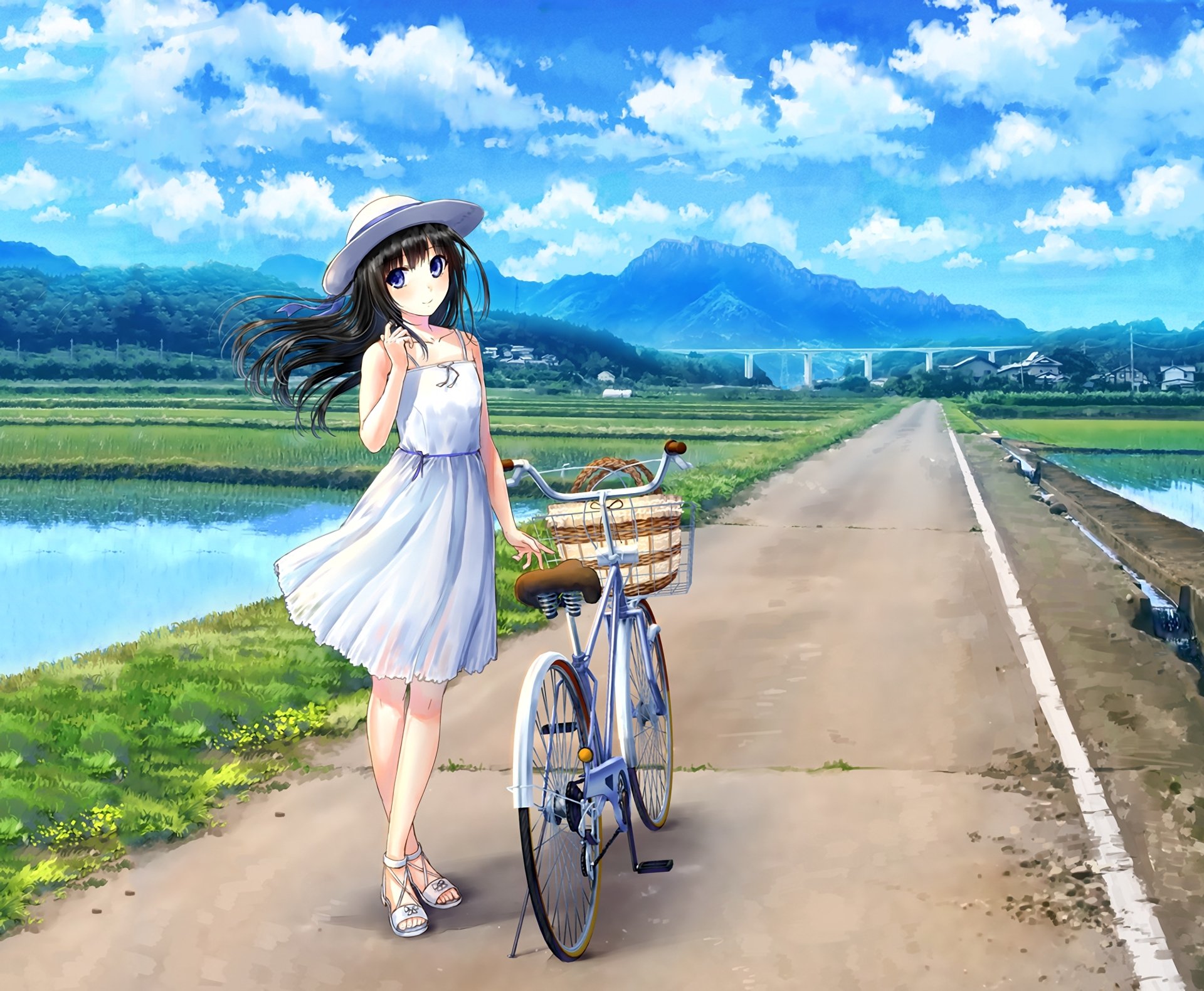 A serene anime scene featuring a girl in a white dress, standing beside a bicycle on a picturesque road with lush greenery and mountains in the background. HD desktop wallpaper.