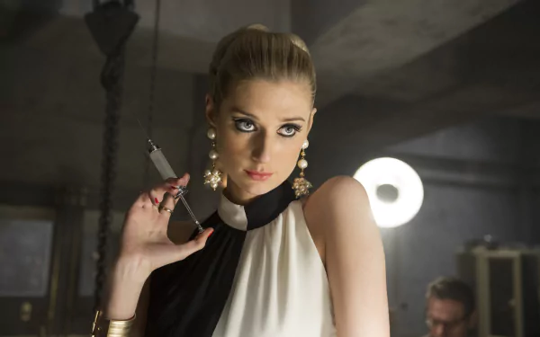 4K Ultra HD desktop wallpaper featuring Elizabeth Debicki as Victoria Vinciguerra from the movie The Man from U.N.C.L.E., showcasing a dramatic and stylish scene.