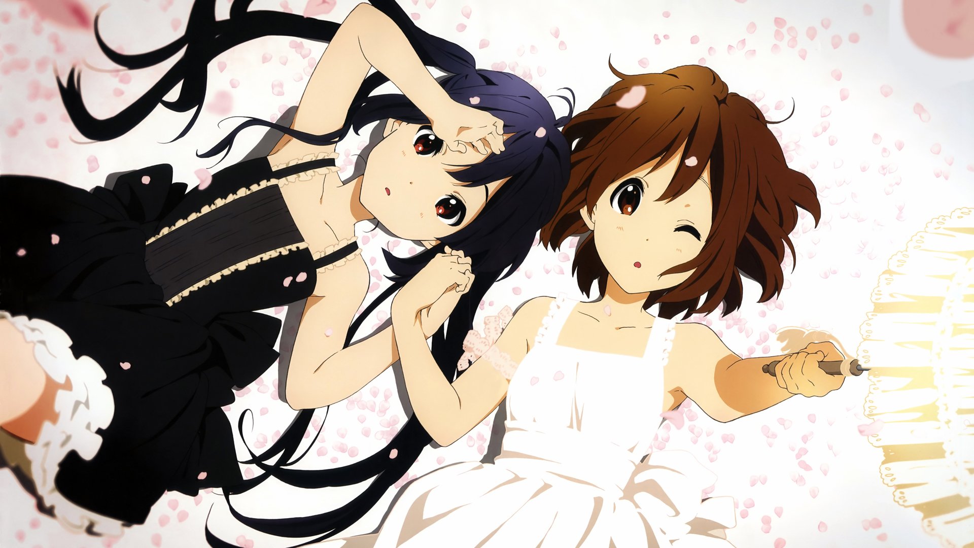 HD anime desktop wallpaper featuring Azusa Nakano and Yui Hirasawa from K-ON! in elegant black and white dresses surrounded by falling cherry blossoms.
