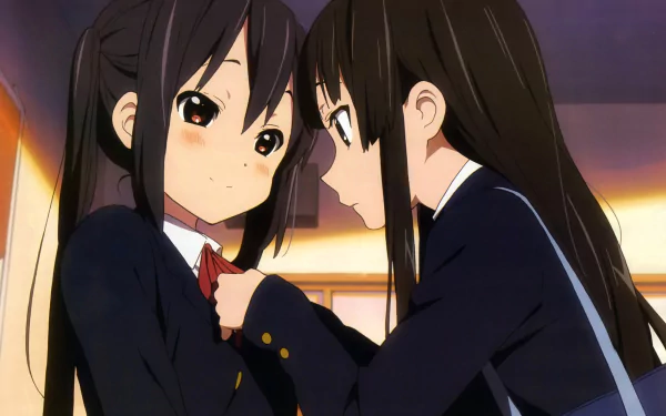 Azusa Nakano and Mio Akiyama from the anime K-ON! share a close moment in this HD PC desktop wallpaper, highlighting their friendship and school life.