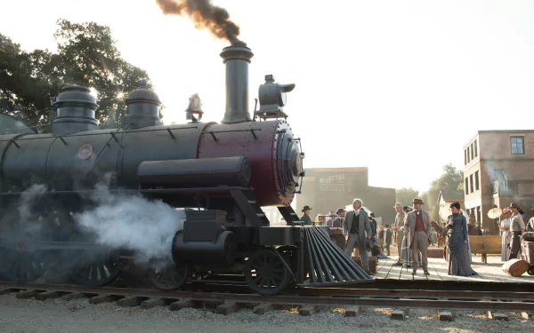 A vintage steam train stands on the tracks, surrounded by characters from the TV show Westworld, set against a sunlit backdrop, creating a captivating HD desktop wallpaper.