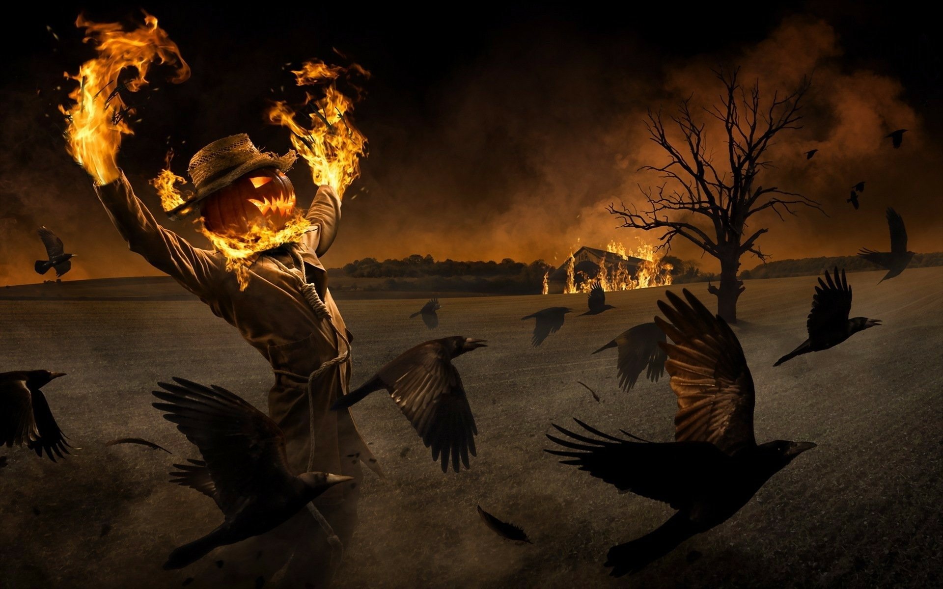 A fiery pumpkin-headed scarecrow stands at night surrounded by ravens under a dark sky, creating a spooky Halloween scene for an HD PC desktop wallpaper.