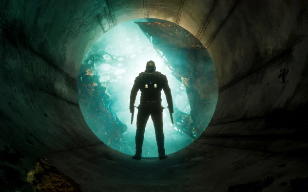 Peter Quill, also known as Star-Lord, stands heroically in a circular tunnel, illuminated by vibrant light in this HD desktop wallpaper from Guardians of the Galaxy Vol. 2.