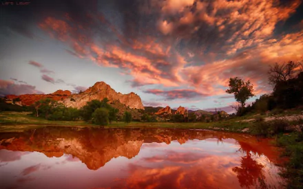  Clouds Reflected in Lake by Lars Leber