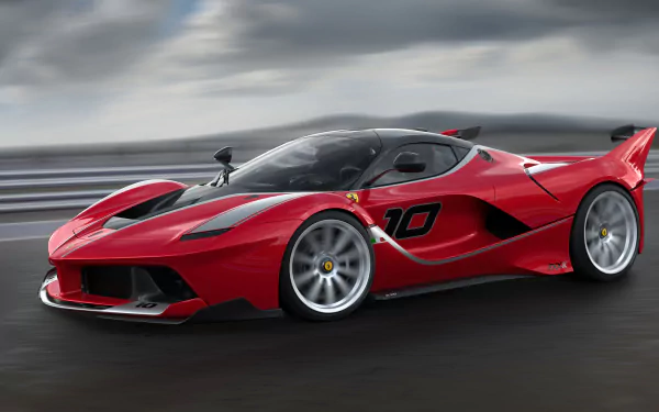Red Ferrari FXX K vehicle racing on a wet track under dramatic clouds — 4K Ultra HD PC desktop wallpaper and background.