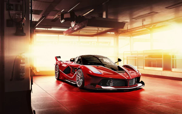 A striking red Ferrari FXX K supercar in a sunlit garage, showcased in vivid 4K Ultra HD as a PC desktop wallpaper and background.