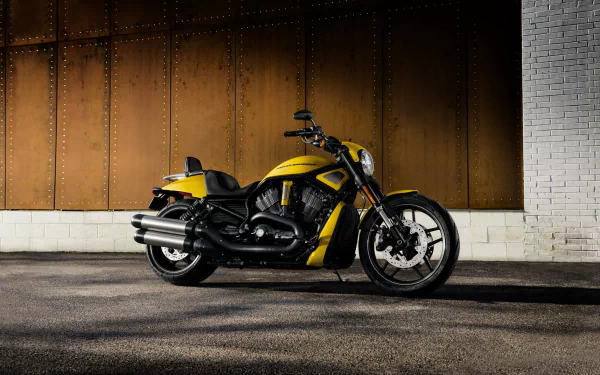Harley-Davidson Night Rod Special motorcycle parked against a textured wall, featured as a HD PC desktop wallpaper and background.