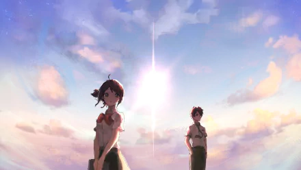 Taki Tachibana and Mitsuha Miyamizu stand against a vibrant sky in this HD wallpaper inspired by the anime Your Name. Their expressions reflect a mix of determination and longing.