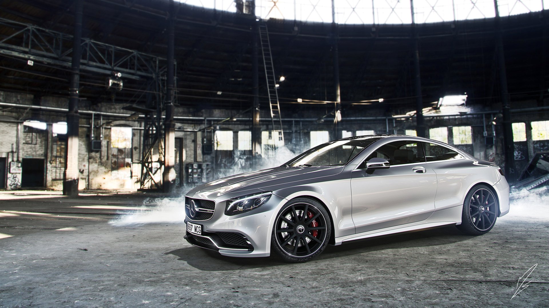 Silver Mercedes-Benz S-Class coupe showcased in a spacious industrial setting, featured as an HD PC desktop wallpaper and background.