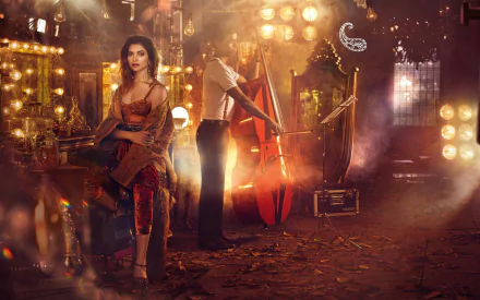 HD desktop wallpaper featuring Indian celebrity Deepika Padukone in an elaborate, dimly lit set with warm lighting and vintage decor, creating an enchanting and glamorous atmosphere.