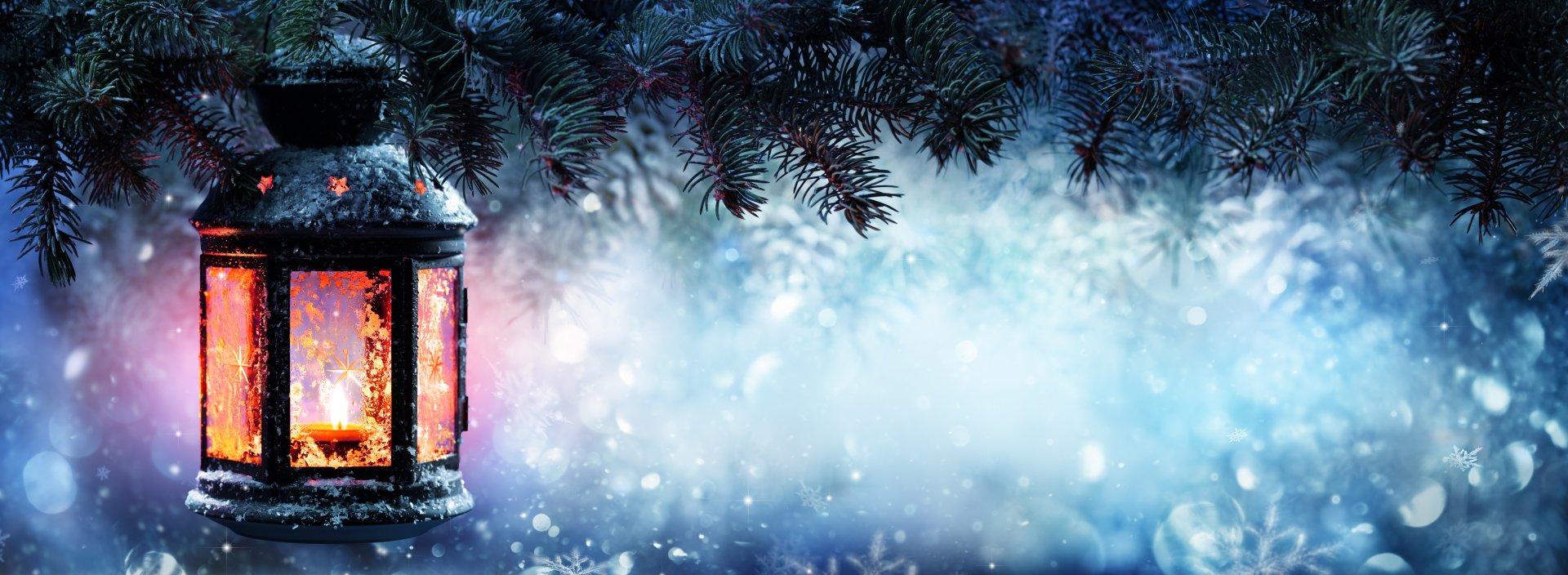 A glowing lantern hanging from snowy pine branches, casting warm light in a festive Christmas scene, rendered in 4K Ultra HD for PC desktop wallpaper and background.