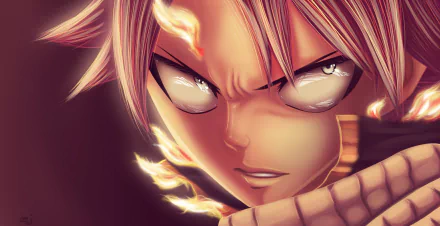 HD desktop wallpaper featuring Natsu Dragneel from the anime Fairy Tail, showcasing an intense close-up with flames around his face.