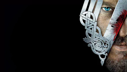 HD desktop wallpaper featuring a striking image from the TV show Vikings (2013), showcasing intricate design elements and a close-up of a character's face against a dark backdrop.