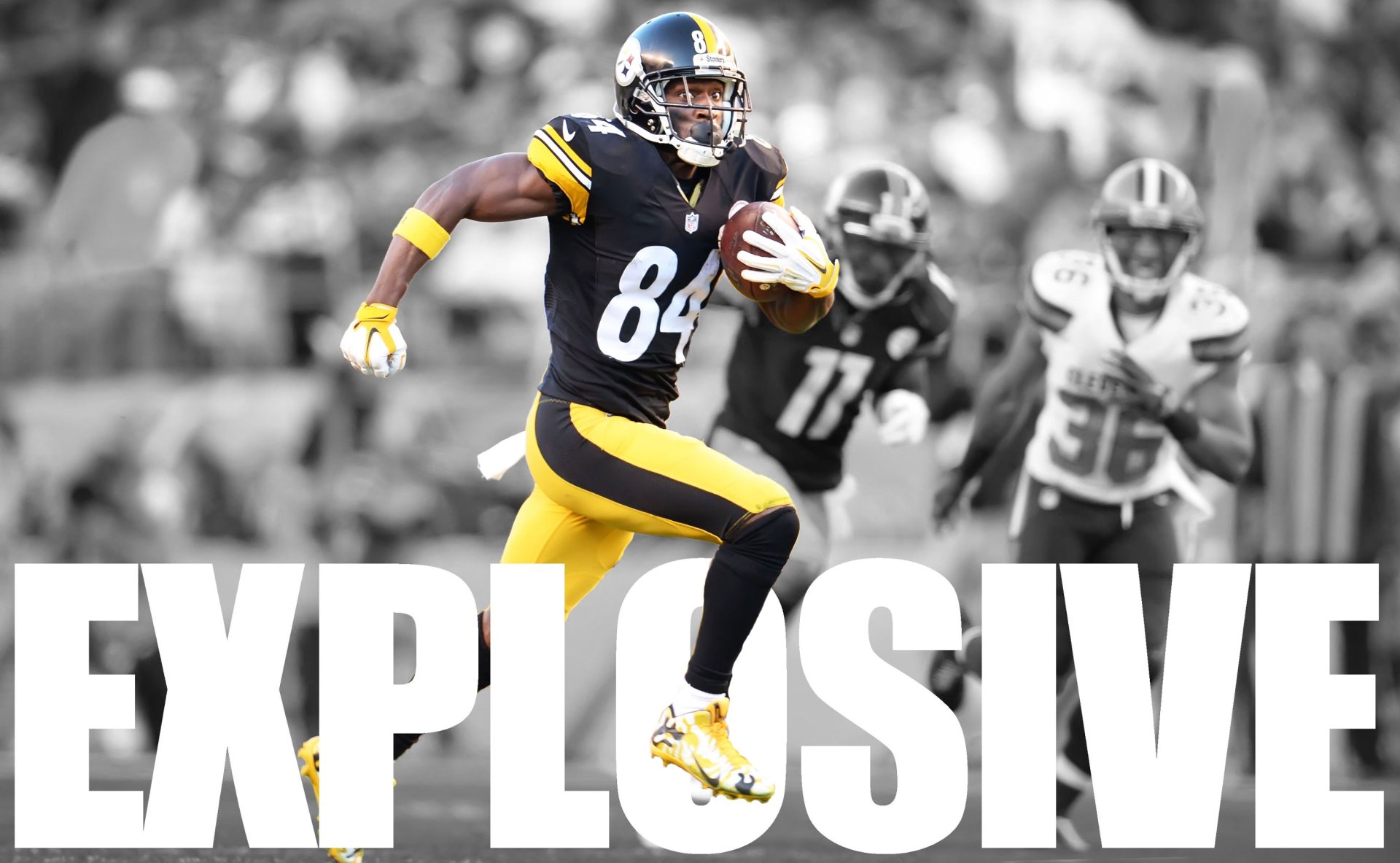 HD wallpaper featuring Antonio Brown in action on the football field with the word EXPLOSIVE and a black-and-white background with selective coloring.