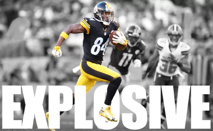 HD wallpaper featuring Antonio Brown in action on the football field with the word EXPLOSIVE and a black-and-white background with selective coloring.