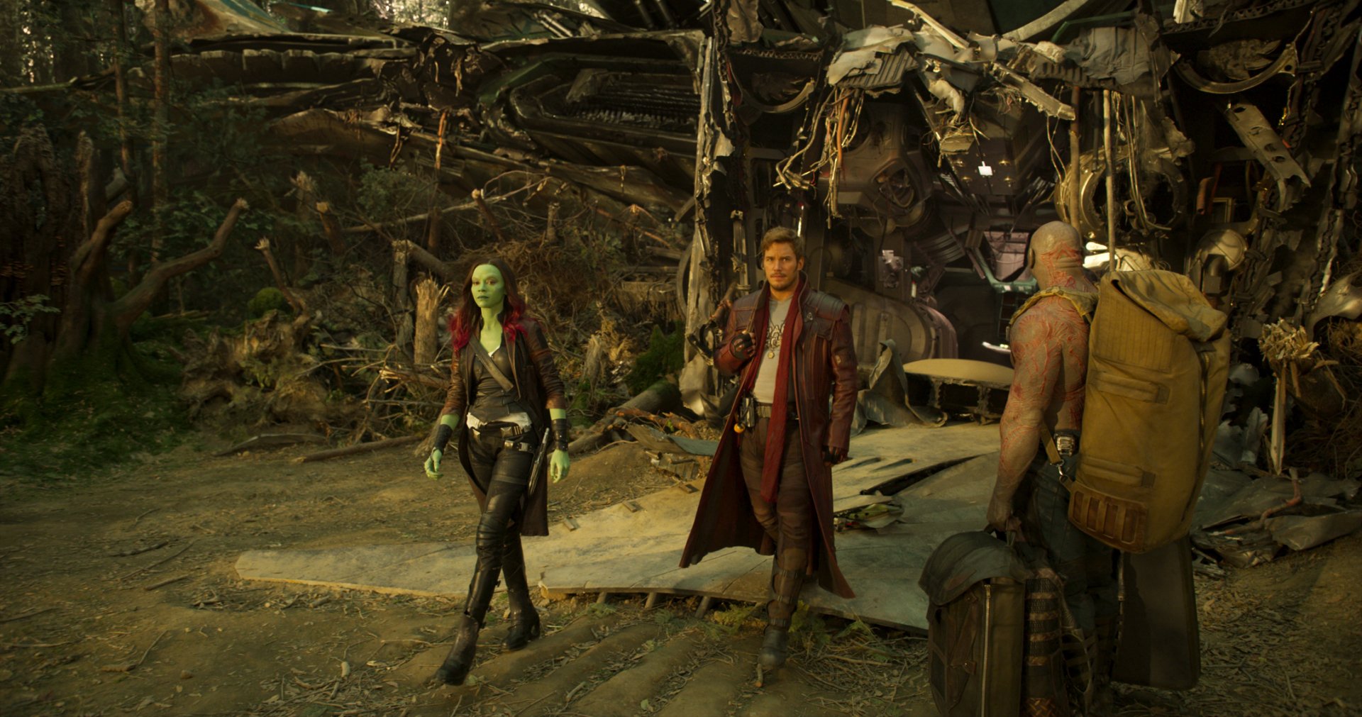 HD desktop wallpaper featuring characters Gamora, Star Lord, and Drax The Destroyer from the movie Guardians of the Galaxy Vol. 2, portrayed by Zoe Saldana, Chris Pratt, and Dave Bautista.