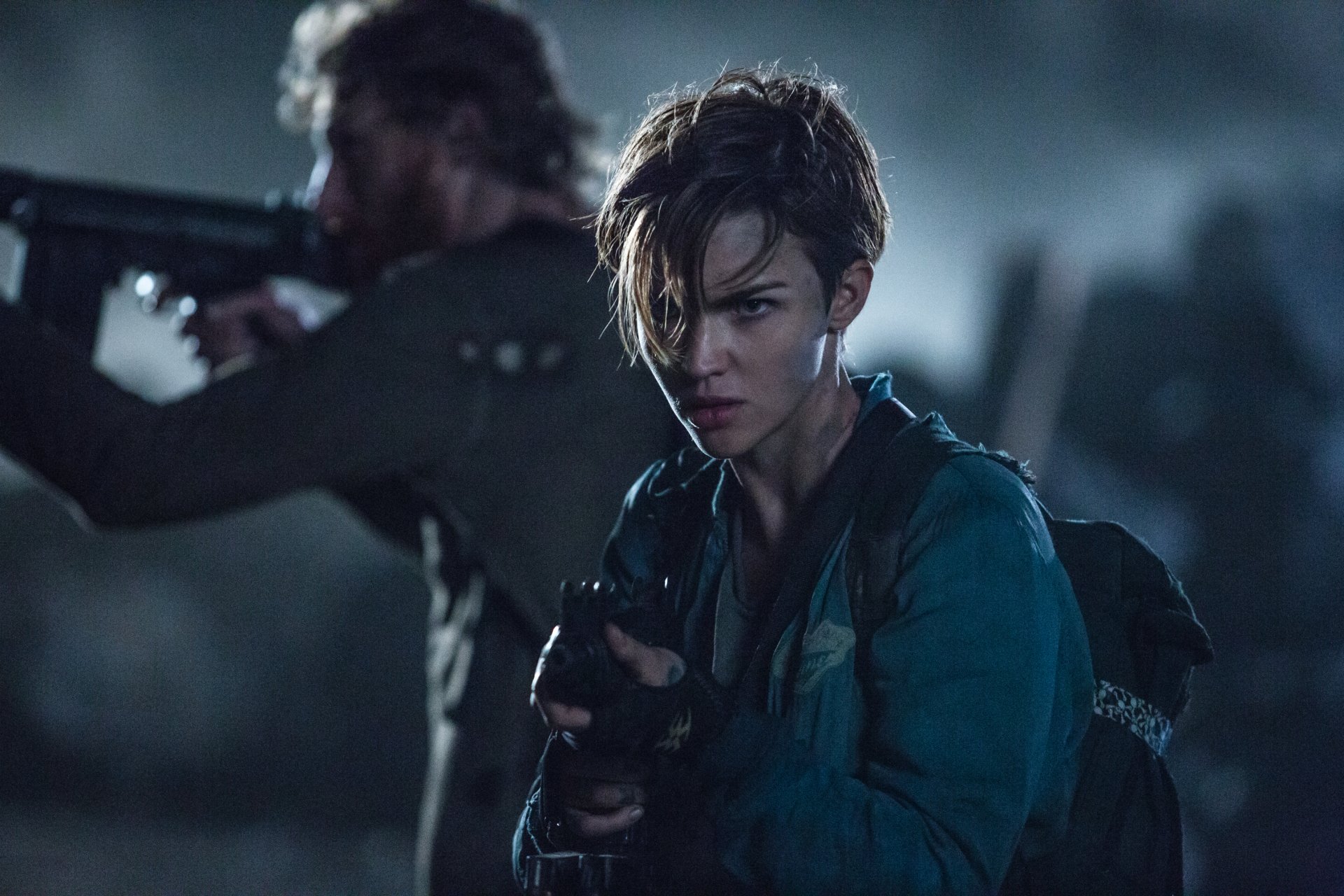 HD PC desktop wallpaper featuring intense characters from the movie Resident Evil: The Final Chapter in a dark, action-packed scene.