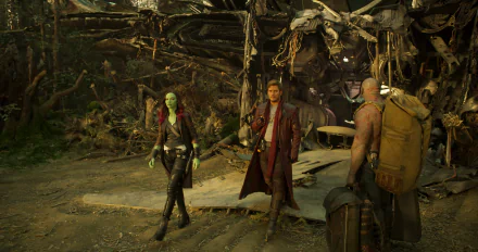 HD desktop wallpaper featuring characters Gamora, Star Lord, and Drax The Destroyer from the movie Guardians of the Galaxy Vol. 2, portrayed by Zoe Saldana, Chris Pratt, and Dave Bautista.