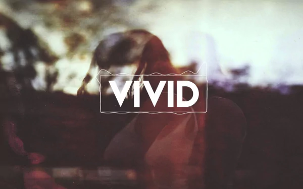 HD desktop wallpaper featuring a stylized, abstract image with the text VIVID, related to The Chainsmokers.