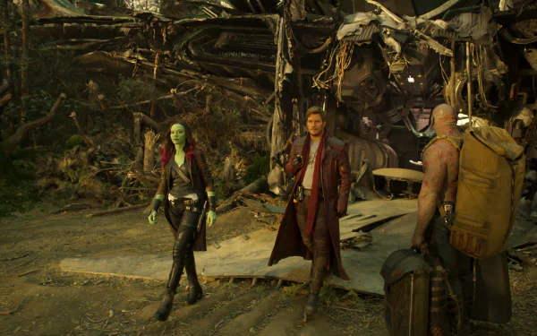 HD desktop wallpaper featuring characters Gamora, Star Lord, and Drax The Destroyer from the movie Guardians of the Galaxy Vol. 2, portrayed by Zoe Saldana, Chris Pratt, and Dave Bautista.