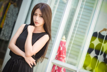 Asian woman with brown eyes and brunette hair wearing a black dress poses confidently indoors, captured in high definition for a PC desktop wallpaper.
