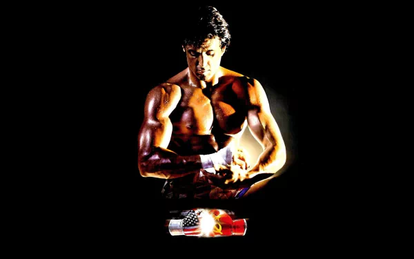 HD PC desktop wallpaper: shirtless, muscular boxer with taped hands and a championship belt, dramatic spotlighting — Rocky IV movie poster–style.