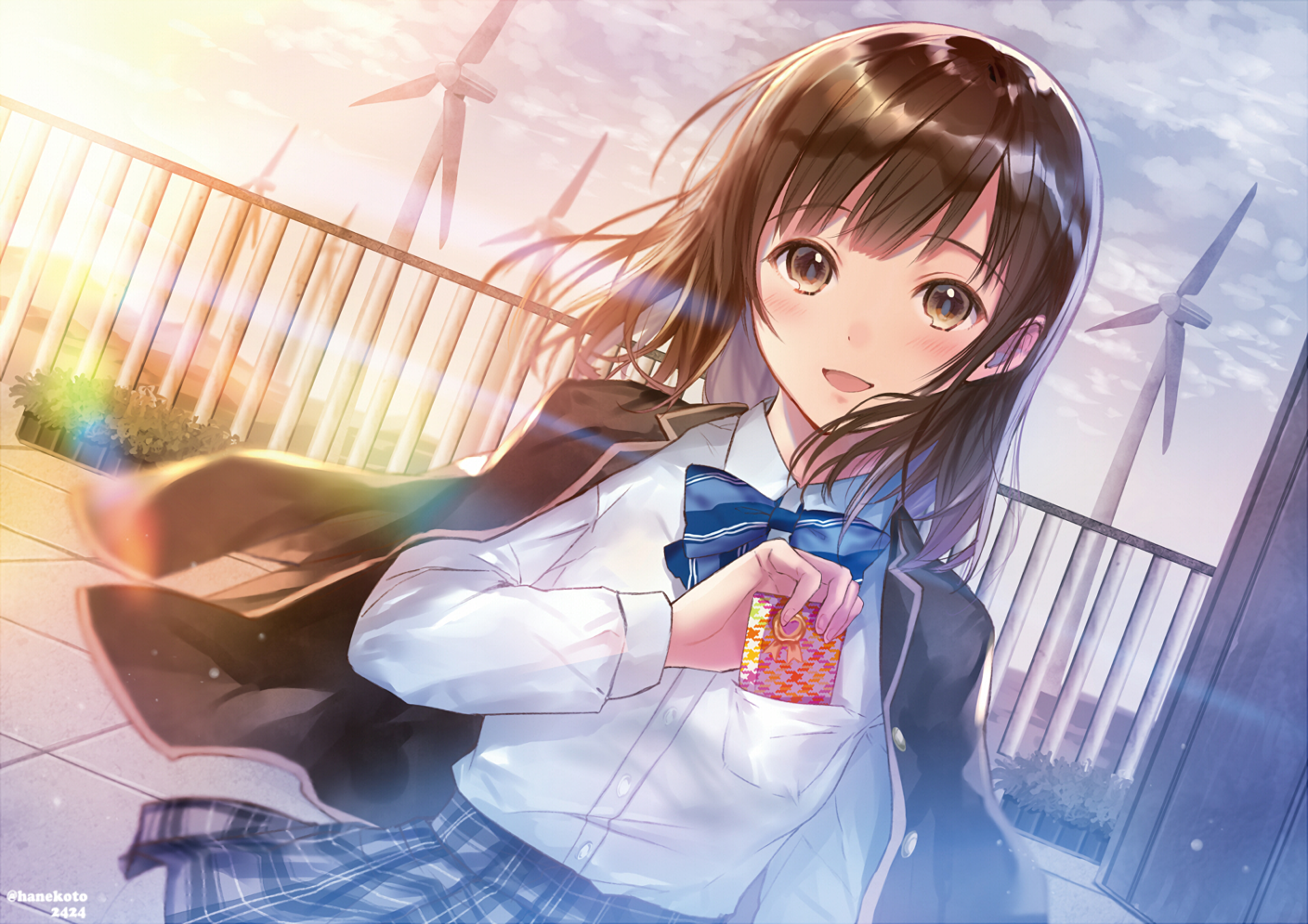 Anime original HD PC desktop wallpaper: smiling schoolgirl with blue bow and wind-swept hair on a rooftop, holding a small snack, warm sunset light and wind turbines in the background.
