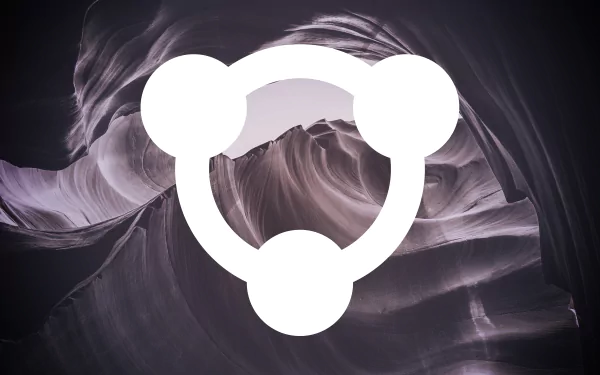 Artistic 4K Ultra HD polyscape of a cave interior featuring smooth, flowing rock formations with the Ubuntu logo blended seamlessly into the scene.