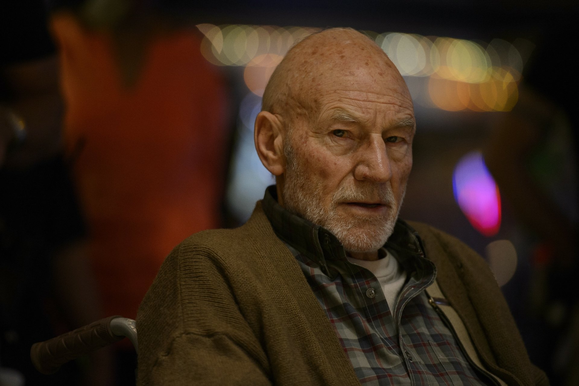 HD desktop wallpaper featuring Patrick Stewart as Professor X from the movie Logan.