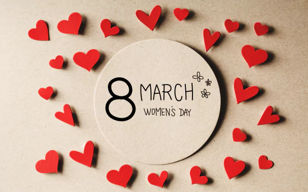4K Ultra HD desktop wallpaper featuring a circular card with 8 March Women's Day surrounded by scattered red hearts, celebrating the holiday with a warm, heartfelt design.