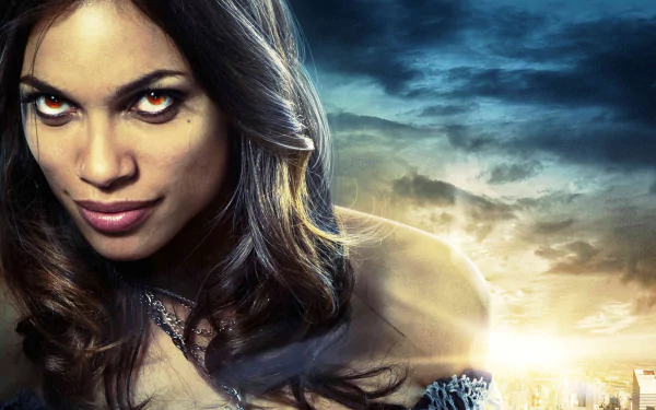 HD PC desktop wallpaper featuring a close-up of a character from the movie Percy Jackson & the Olympians: The Lightning Thief against a dramatic sky backdrop.