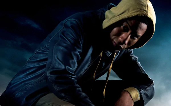 HD PC desktop wallpaper featuring a dark, moody image from the movie Percy Jackson & the Olympians: The Lightning Thief, with a hooded figure in a leather jacket.