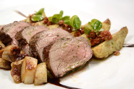 2K Quad HD PC desktop wallpaper: close-up of sliced roasted meat with pan-roasted potato wedges, mushrooms and microgreens on a white plate — food, potato, meat.