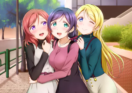 HD anime desktop wallpaper featuring Nozomi Tojo, Maki Nishikino, and Eri Ayase from Love Live! posing together outdoors with warm expressions.