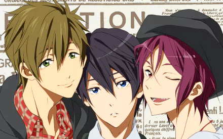 HD PC wallpaper depicting Makoto Tachibana, Haruka Nanase, and Rin Matsuoka from the anime Free!, smiling and posed close together against a newspaper-print background.