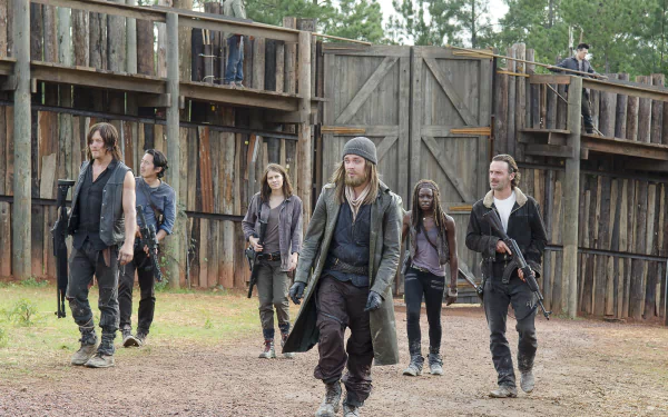 HD desktop wallpaper featuring The Walking Dead characters Rick Grimes, Daryl Dixon, Michonne, Maggie Greene, and Paul 'Jesus' Monroe, portrayed by Andrew Lincoln, Norman Reedus, Danai Gurira, Lauren Cohan, and Tom Payne.