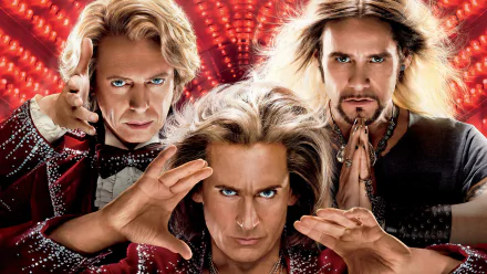 HD desktop wallpaper featuring Steve Buscemi, Steve Carell, and Jim Carrey from the movie The Incredible Burt Wonderstone with a vibrant red background.
