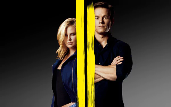HD desktop wallpaper for the 2003 heist film The Italian Job: a woman and a man stand side-by-side split by a vertical yellow paint stripe on a gray background.