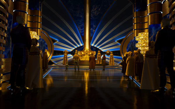Ayesha and the Sovereign stand in an ornate, golden chamber from Guardians of the Galaxy Vol. 2, featuring rich lighting and futuristic architectural design.