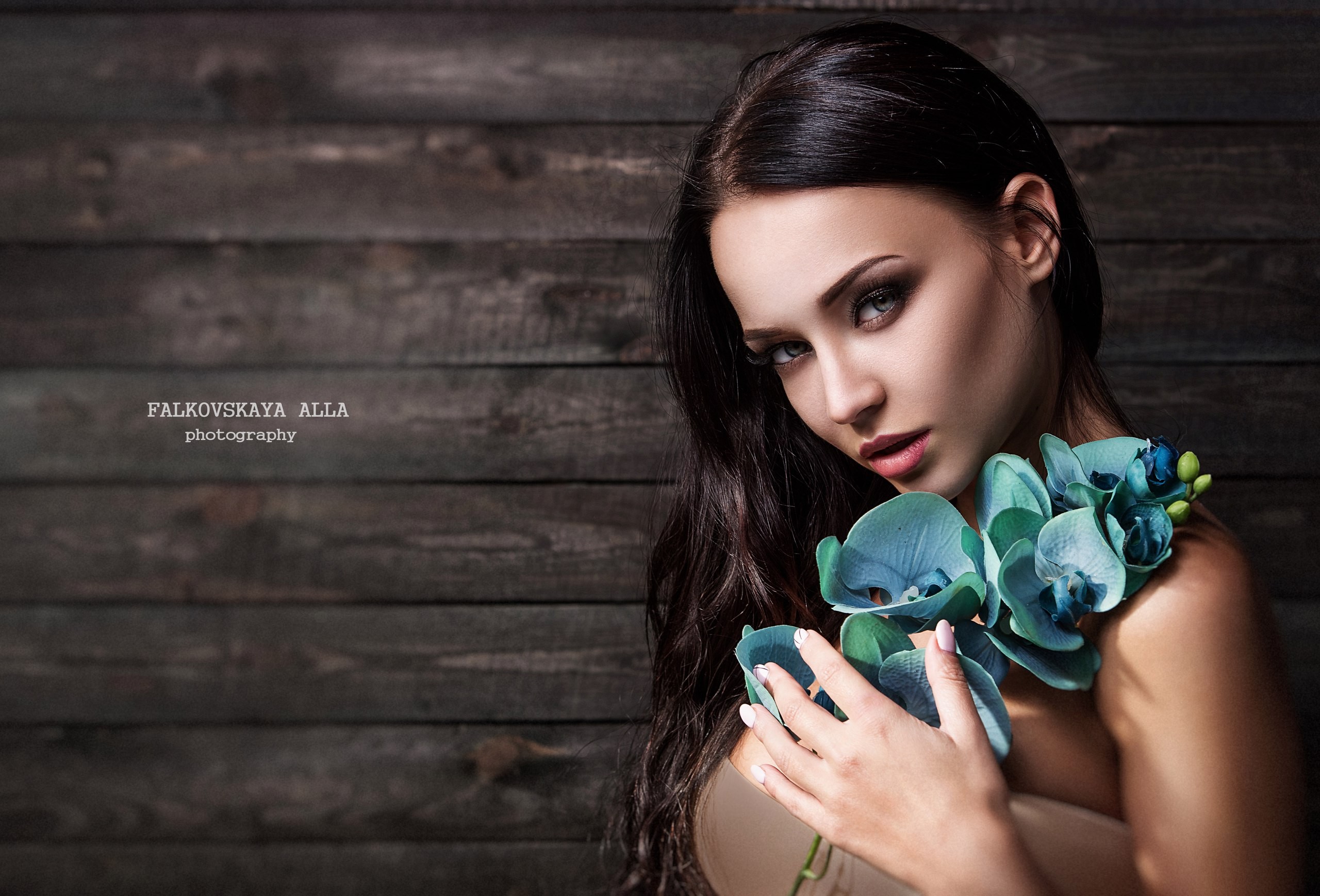 Girl with Blue Orchids by Alla Falkovskaya