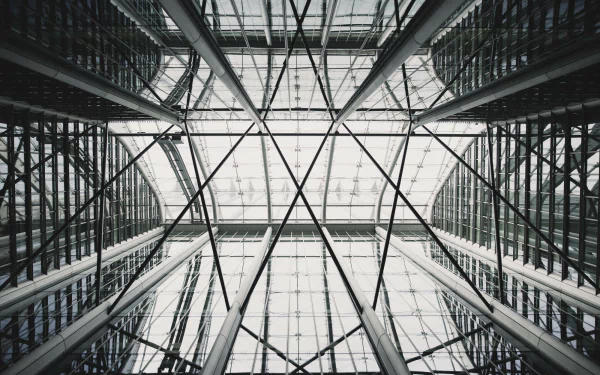 HD PC desktop wallpaper: symmetrical man-made architectural ceiling with intersecting steel beams and glass skylight, abstract geometric perspective.