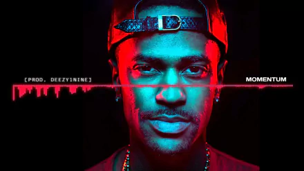 HD desktop wallpaper featuring a stylized portrait of Big Sean with a red and blue color scheme and the text Momentum.