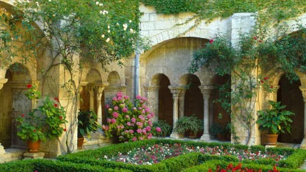 HD desktop wallpaper featuring a serene courtyard garden in spring, with ivy-clad arches, flowering plants, and manicured hedges.