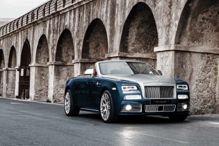 HD desktop wallpaper featuring a blue Rolls-Royce Dawn grand tourer parked on a road beside an old stone wall with arches, exuding luxury and elegance.