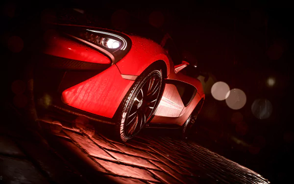 Close-up of a red sports car from Need For Speed (2015) in a dark, atmospheric setting, featured as a 4K Ultra HD PC wallpaper and background.