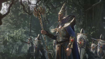 HD wallpaper of a character from Total War: Warhammer II, poised with a staff in a mystical forest setting.