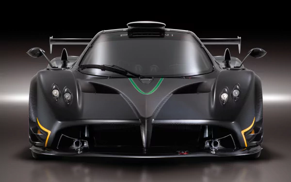 HD PC desktop wallpaper background: front view of matte-black Pagani Zonda R supercar vehicle with racing wing and aggressive aerodynamics.