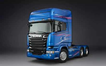 Blue Scania R730 truck showcased against a dark background, captured in 4K Ultra HD quality as a striking PC desktop wallpaper.