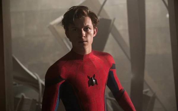 HD desktop wallpaper of Tom Holland as Peter Parker in the movie Spider-Man: Homecoming, showing him in the Spider-Man suit against a dimly lit urban background.